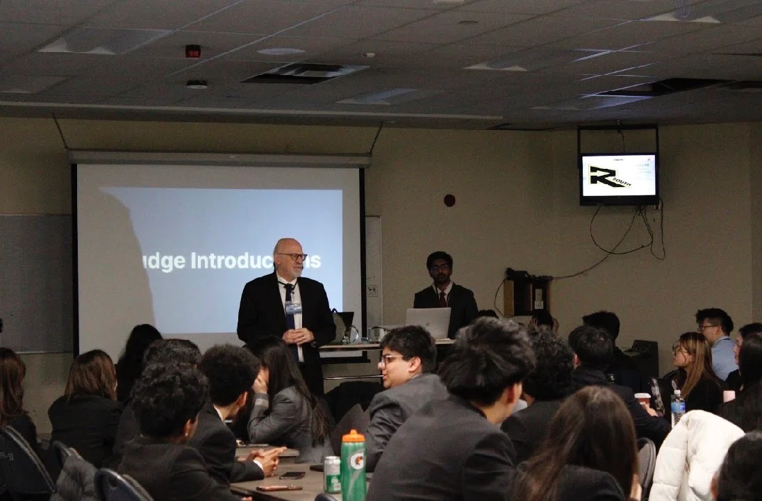 A judge introducing himself to the room